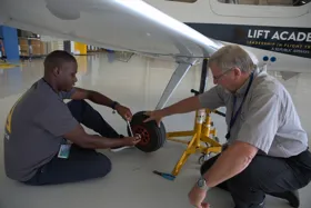 a person working on a tire