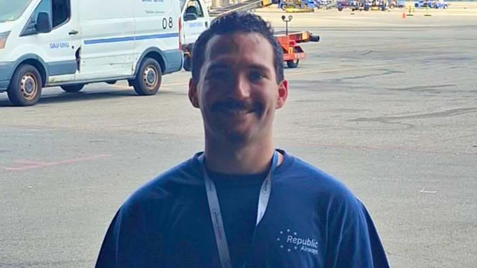 a person smiling at the camera