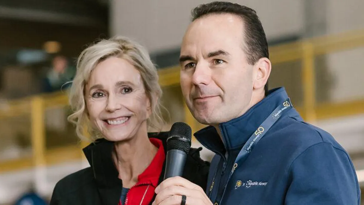 a person and person holding a microphone
